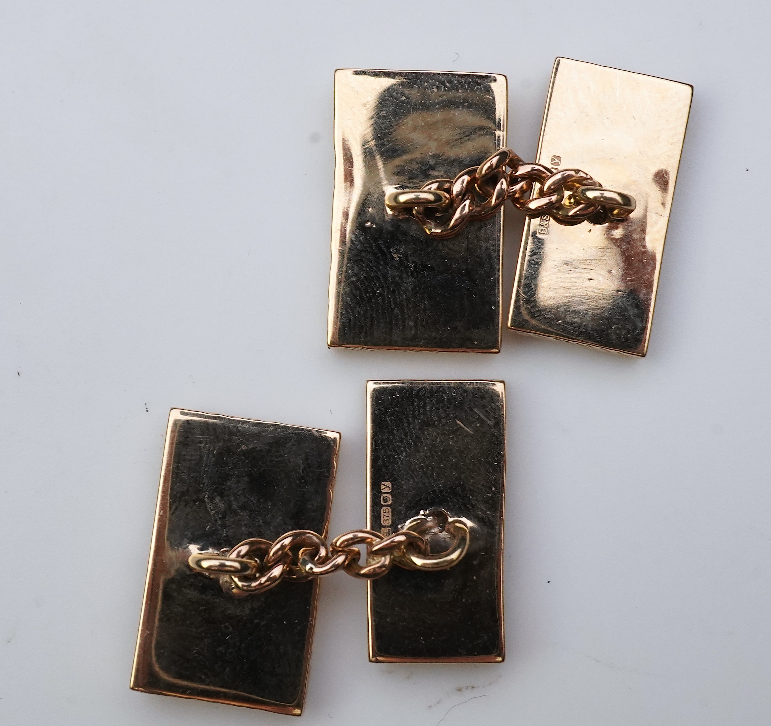 A pair of 9ct gold and diamond cufflinks, 1970s